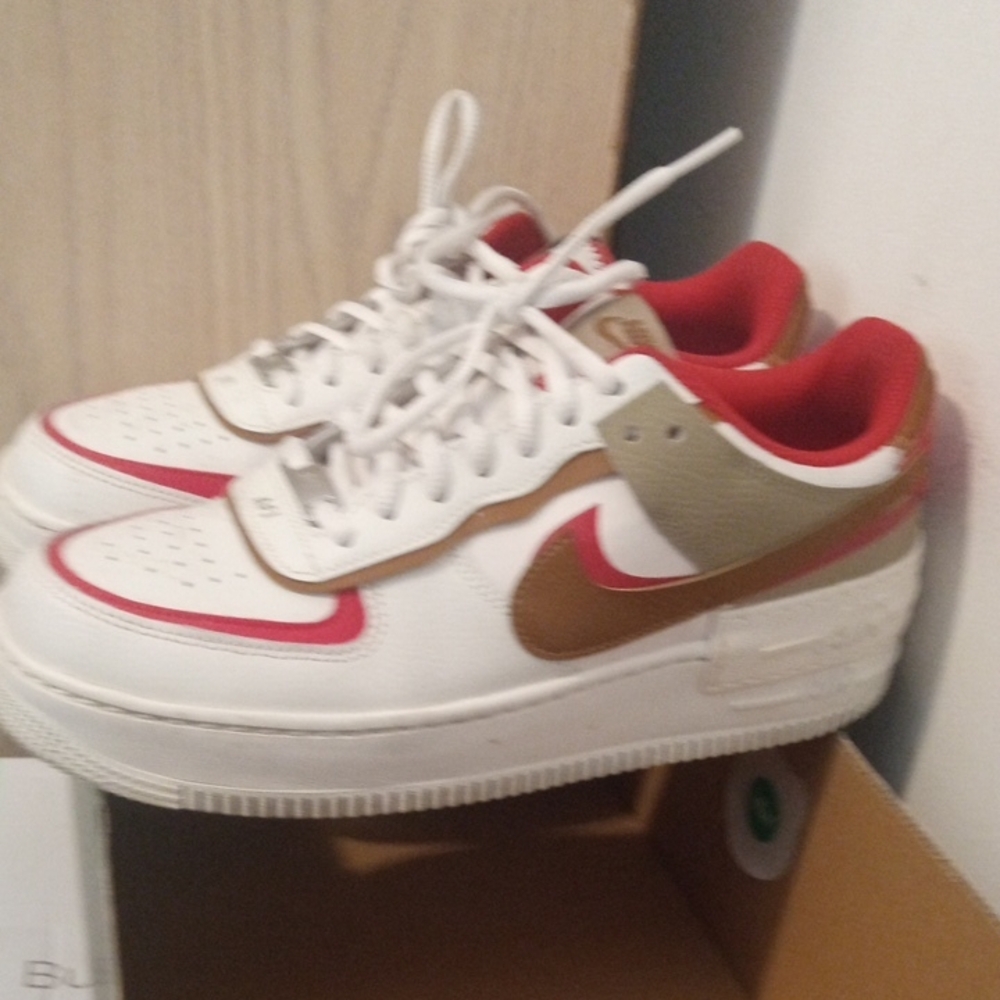 Nike White and Gold Athletic Shoes